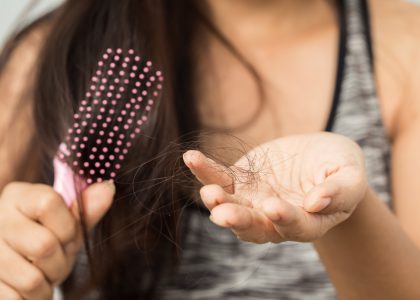 young woman worried about hair loss